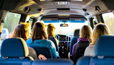 Commuters riding together in a comfortable van, representing AVR Vanpool services Commuters riding together in a comfortable van, representing AVR Vanpool services